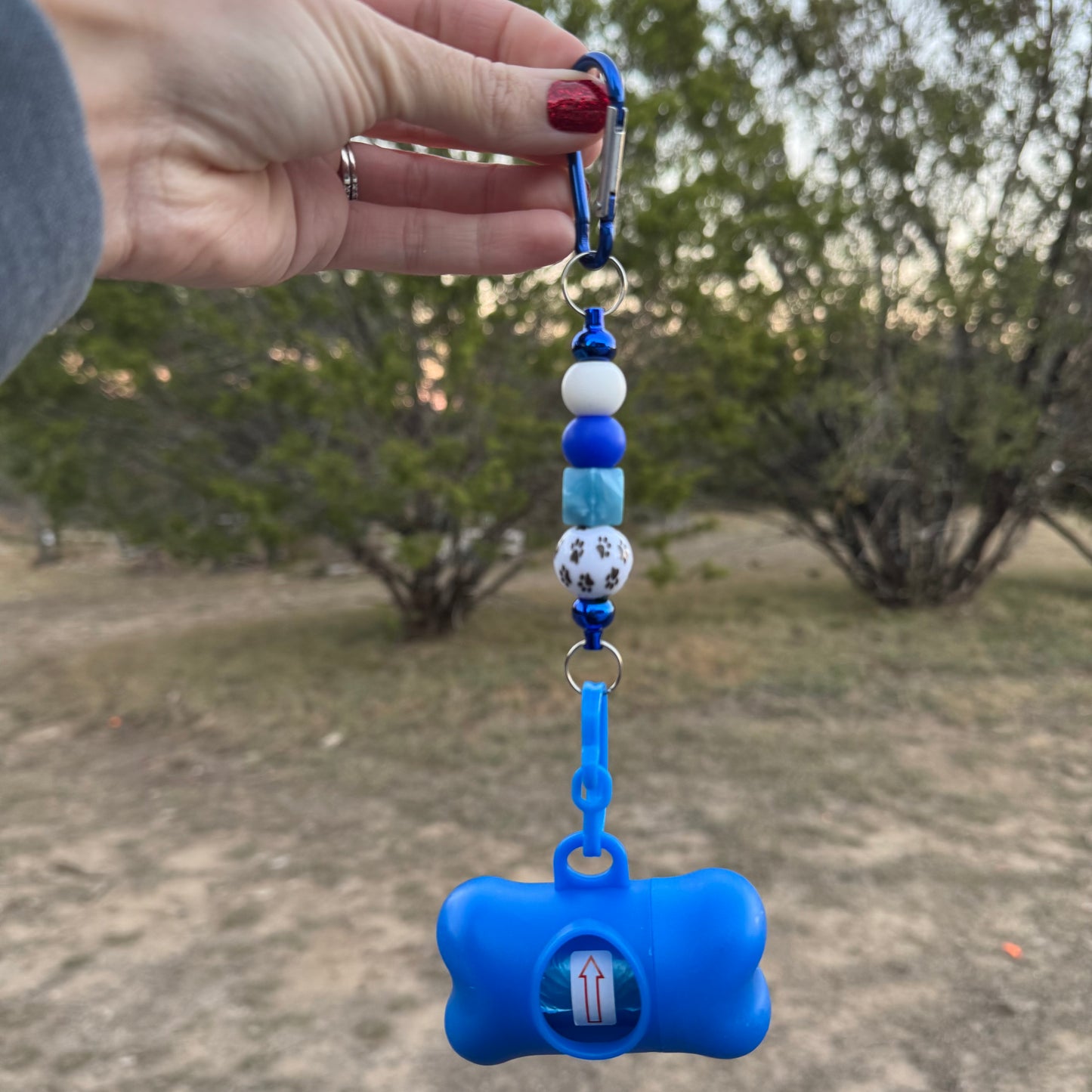 Blue Dog Paw Doggy Bag Holder